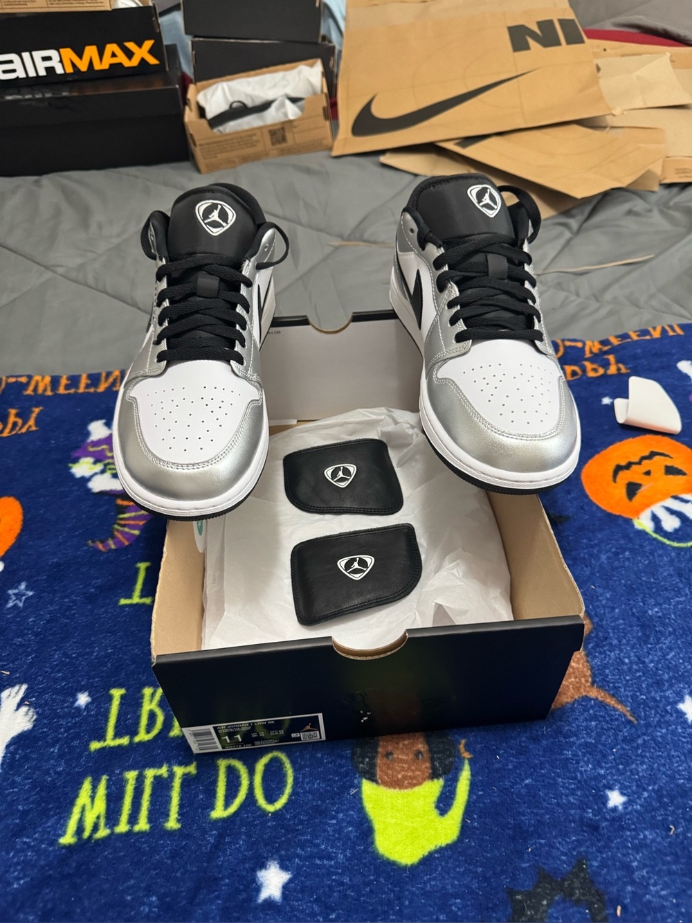 Air Jordan 1 Low Silver and Black Sneakers